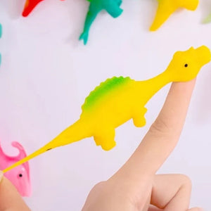 🦖Slingshot Dinosaur Toys (Colors random)